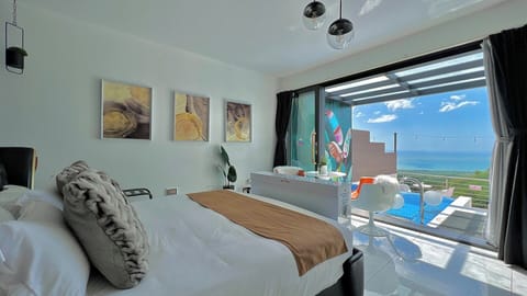 Experience stunning views right at your feet from the comfort of a king-size bed.

