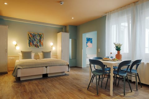 City Studio Suite | Individually decorated, desk, laptop workspace, iron/ironing board