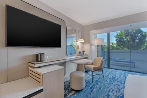 Premium bedding, down comforters, pillowtop beds, in-room safe