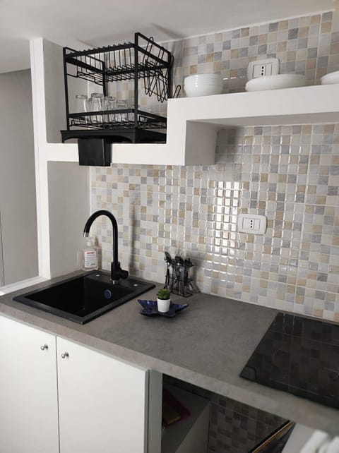 Family Condo | Private kitchen | Mini-fridge, stovetop, cookware/dishes/utensils