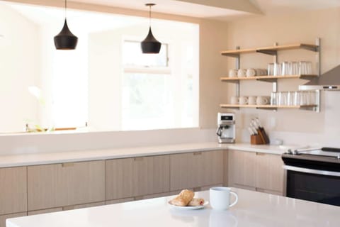 Modern appliances and ample counter space make meal prep a breeze.
