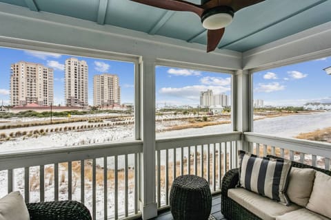 Relax on your private balcony overlooking the resort ponds with the Gulf of Mexico in the distant