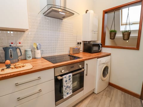 Fridge, electric kettle, toaster, cookware/dishes/utensils