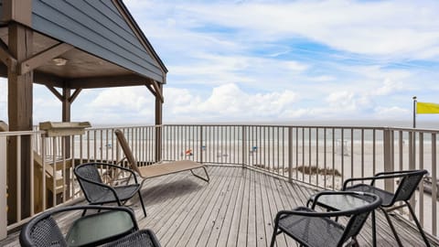 Sandpiper 16C - Relax on the balcony and take in stunning front-row views.