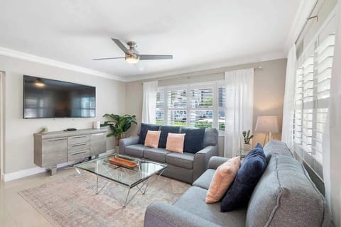 Living room includes a full size pull out couch a 65" TV with Netflix and Prime!