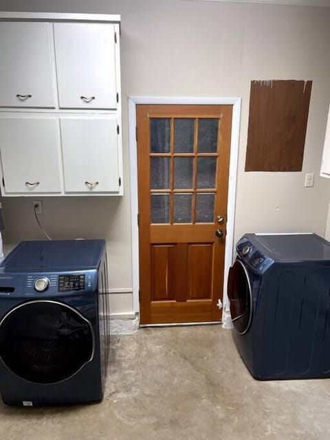 Laundry room with washer and dryer