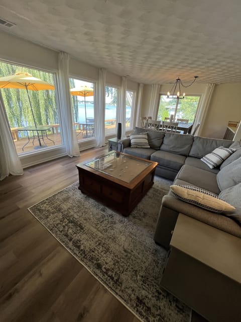 Living Room. Here you can see the amazing lake views out of the large windows.