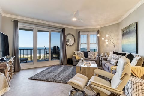 Beautiful Oceanfront Views from this Luxury Great Room Featuring Designer Decor and a Large Flat Screen TV