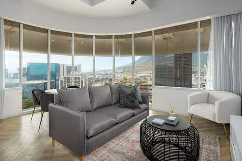 City Apartment | Living area | 40-inch flat-screen TV with cable channels, TV, Netflix