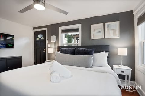 Memory foam king bed with luxury hotel linens and smart tv!
