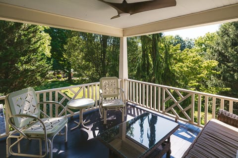 Front porch that is perfect for morning coffee or evening wine!
