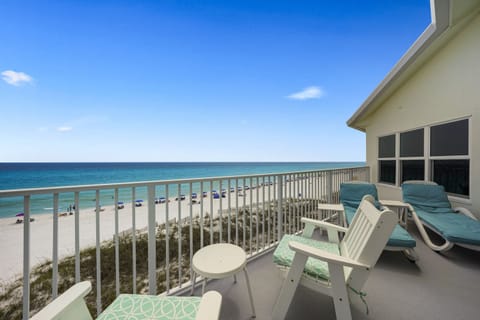 Relax above the shoreline with unobstructed Emerald Coast views