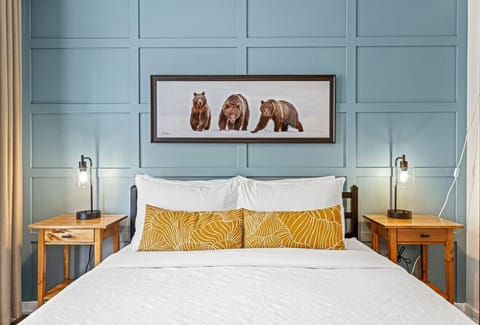 The bedroom feels warm and inviting