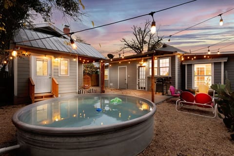 Enjoy the fiesta in a feature-filled backyard oasis! The 10ft heated cowboy pool, with a 125,000 BTU gas heater, is perfect for year-round fun.