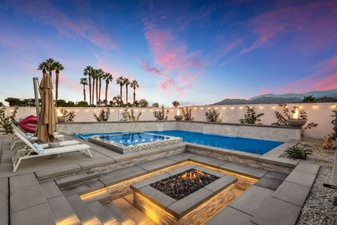 Unwind by the sparkling pool & firepit as the sky glows with a stunning sunset backdrop.