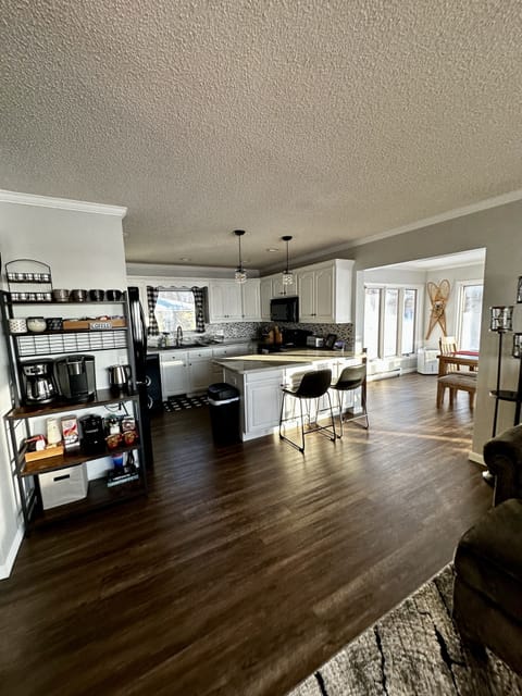 Kitchen area with open concept living space