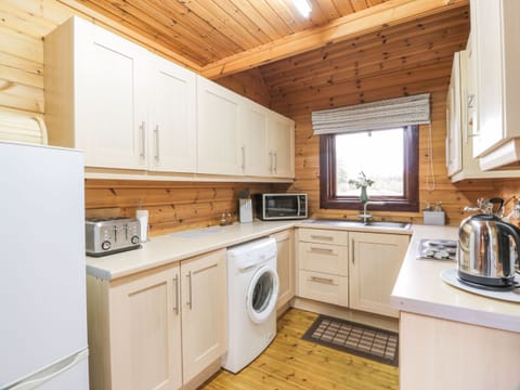 Fridge, electric kettle, cookware/dishes/utensils