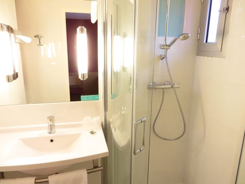 Eco-friendly toiletries, hair dryer, towels