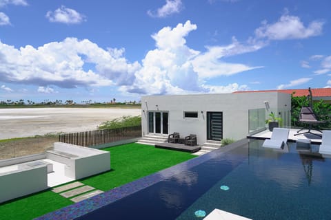 Casa Pristine, pool(deck), seating area.