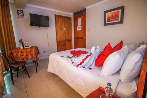 Desk, free WiFi, bed sheets