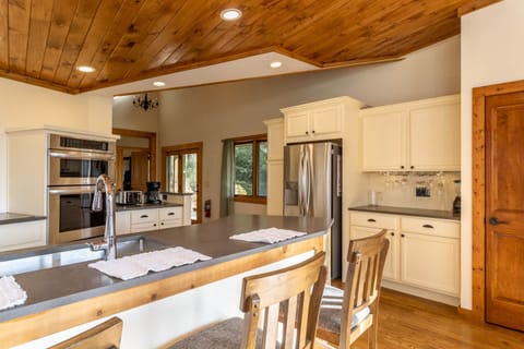 Kitchen with Stainless Appliances and Bar Seating