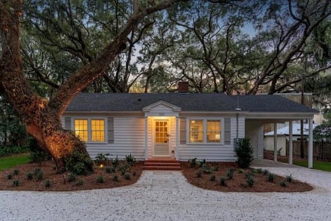Front view of the property with pathway and landscaping