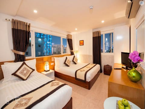 Panoramic Triple Room | Minibar, individually furnished, desk, laptop workspace