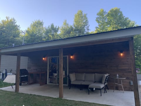 Patio on the side of garage/back yard.