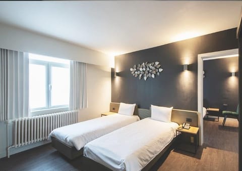 Family Room, 2 Bedrooms | Desk, blackout drapes, iron/ironing board, free WiFi