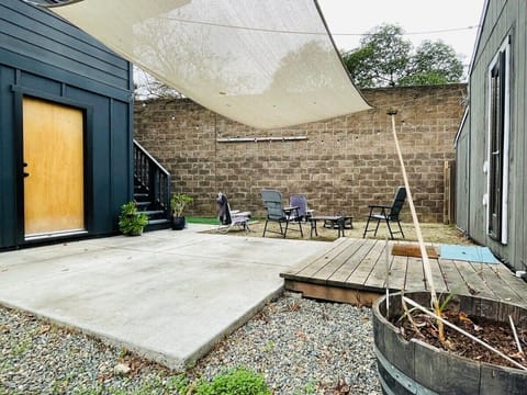 A shared outside space; complete with a fire pit. 