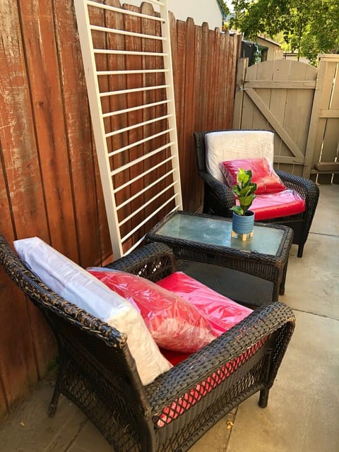 Small, cozy outside porch area. Have coffee in the morning or a glass of wine in the evening.  