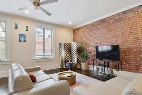 Welcome to our cozy living room! Enjoy a comfortable stay with ample seating.