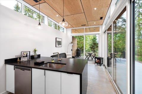 Open concept kitchen and living area with full size appliances