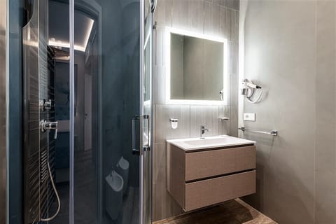 Comfort Room | Bathroom | Rainfall showerhead, hair dryer, slippers, bidet