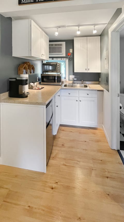 Kitchenette with mini fridge, microwave, Keurig, small oven, electric griddle