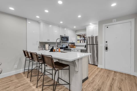 Kitchen: Well-equipped kitchen, updated appliances, drip coffee maker and French Press, kitchen bar w/4 bar stools 