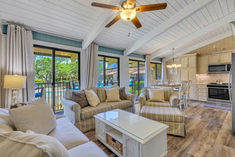Living room with tv and queen sleeper sofa.