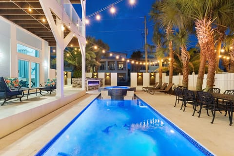 A Tropical Pool That Comes Alive At Night