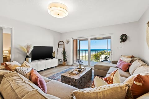 Living Room w/ long, beach view & HUGE sectional