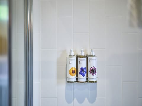 Designer toiletries, towels, soap, shampoo