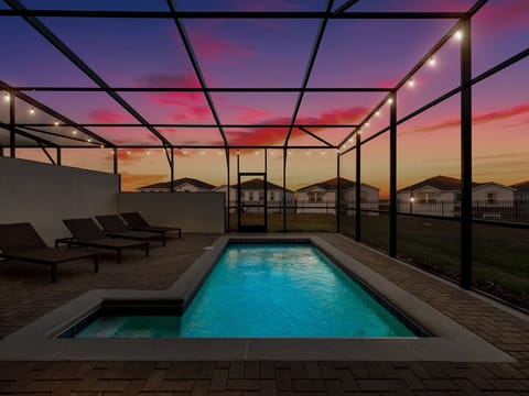 Luxurious Pool with Sun Loungers and Patio Table (Pool Heat & Grill Rentals Available for Additional Fee)