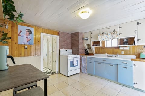 With a beautiful sink, a reliable stove, and a spacious counter, this space invites you to gather with loved ones and make delicious meals.
