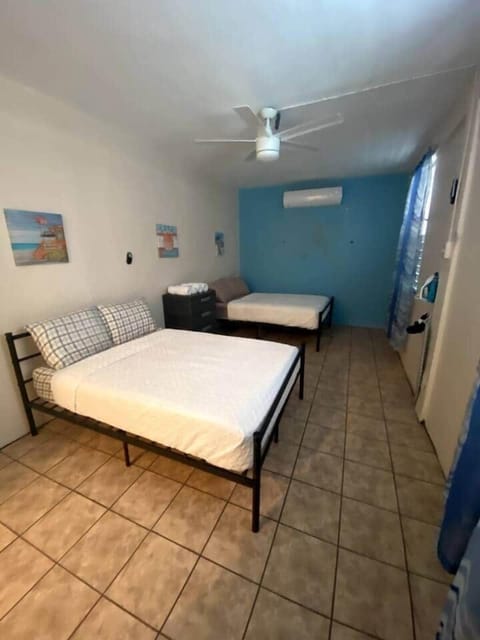 1 bedroom with two full beds for up to 4 people. Bedroom is equipped with an 18,000 Inverter Air Conditioned.