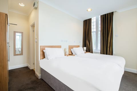 Standard Twin Room | Pillowtop beds, desk, free cribs/infant beds, free WiFi