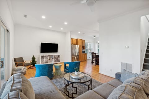 Living room leads into the Kitchen