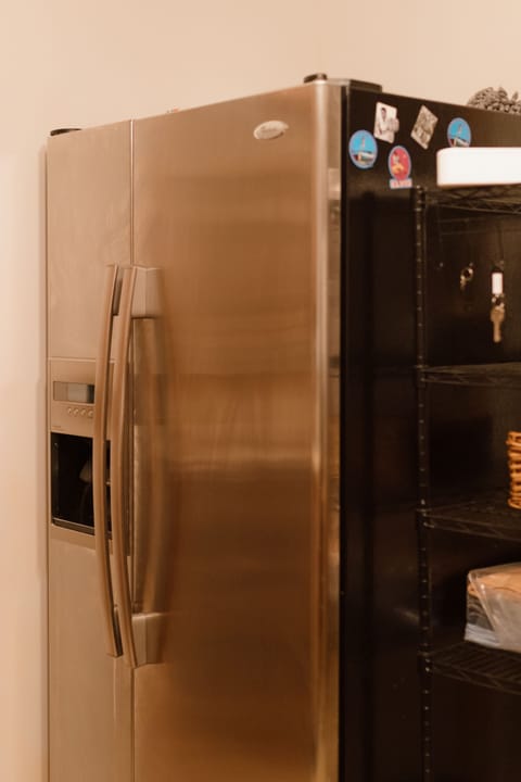 The kitchen is complete with a large double door refrigerator so there will be plenty of room to store all of your beverages & food for the whole group!