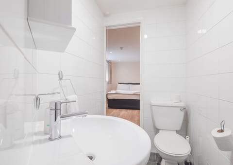 Classic Double Room | Bathroom | Shower, hair dryer, towels, soap