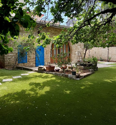 Authentic greenery exterior of Beit Tout