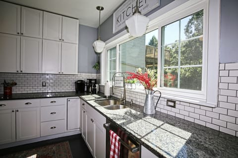 Kitchen Overlooks Backyard & Swimming Pool