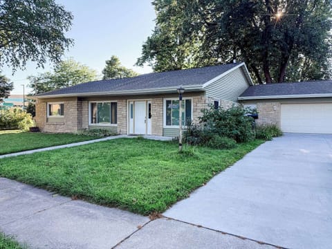 Large, double-wide driveway with ample parking for four vehicles. Street parking also available if needed.
